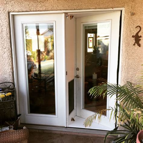 french door with doggie door built in|exterior french door with doggie.